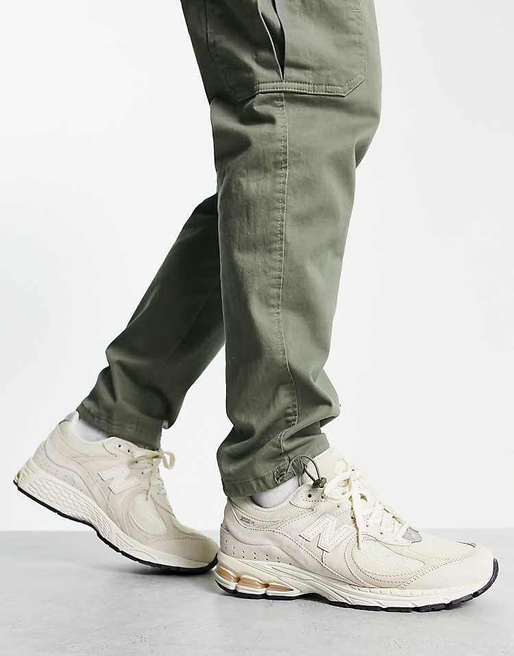 https://images.asos-media.com/products/new-balance-2002-trainers-in-off-white/202382010-1-offwhite?$n_750w$&wid=750&fit=constrain