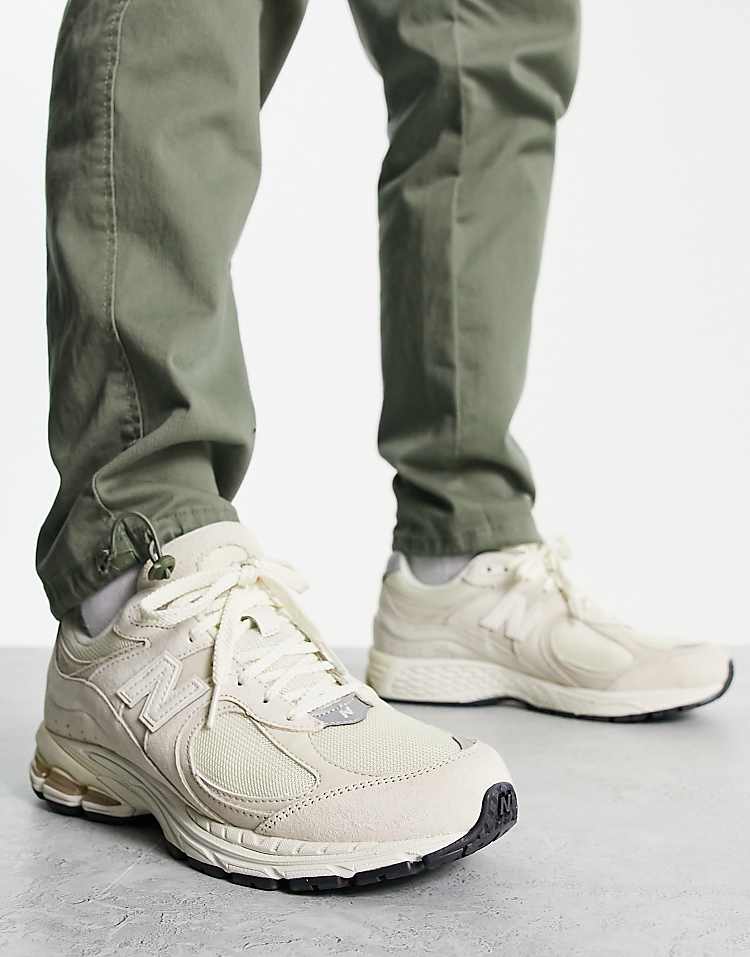 https://images.asos-media.com/products/new-balance-2002-trainers-in-off-white/202382010-2?$n_750w$&wid=750&fit=constrain