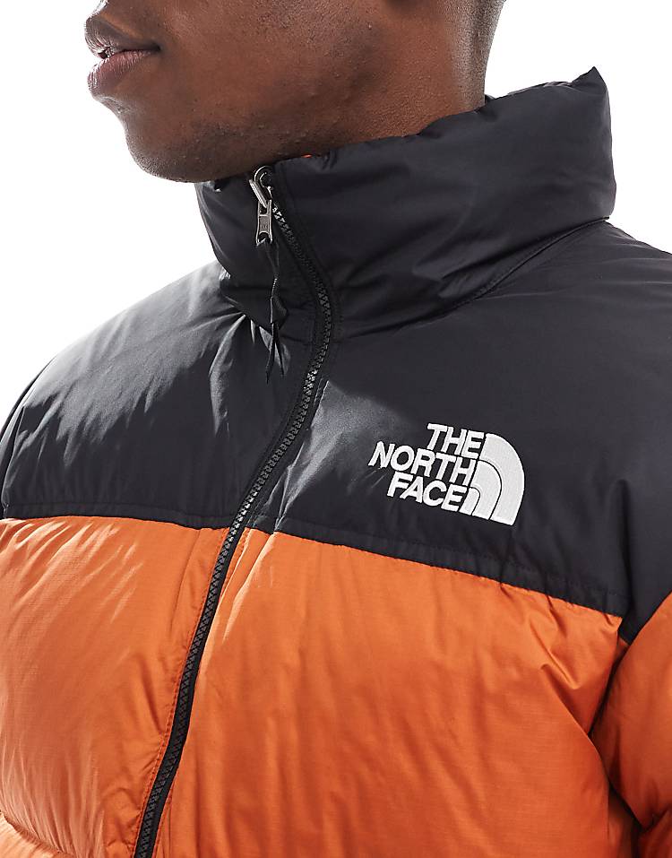 https://images.asos-media.com/products/the-north-face-1996-retro-nuptse-down-puffer-jacket-in-orange/205892612-3?$n_750w$&wid=750&fit=constrain